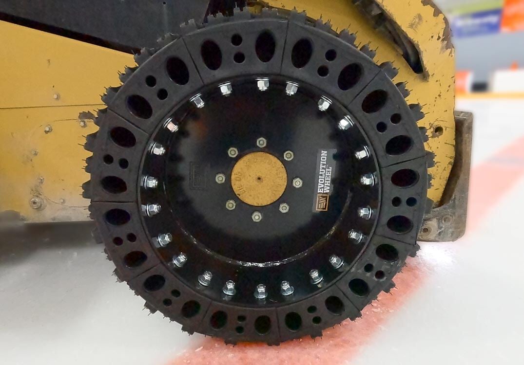 skid steer snow tire on the machine