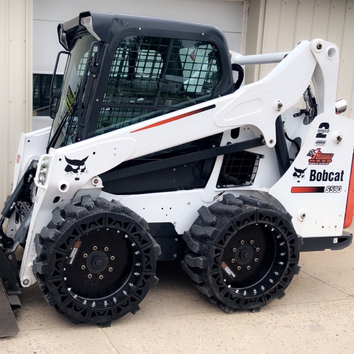 Best Skid Steer Tires for Snow - Evolution Wheel